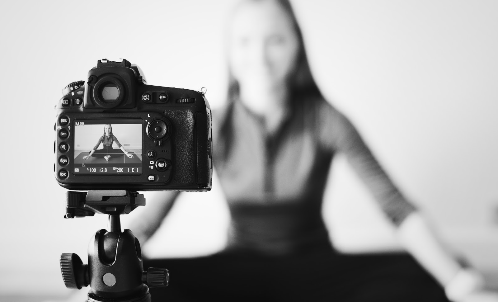 Blogger recording a video with a camera influencer marketing